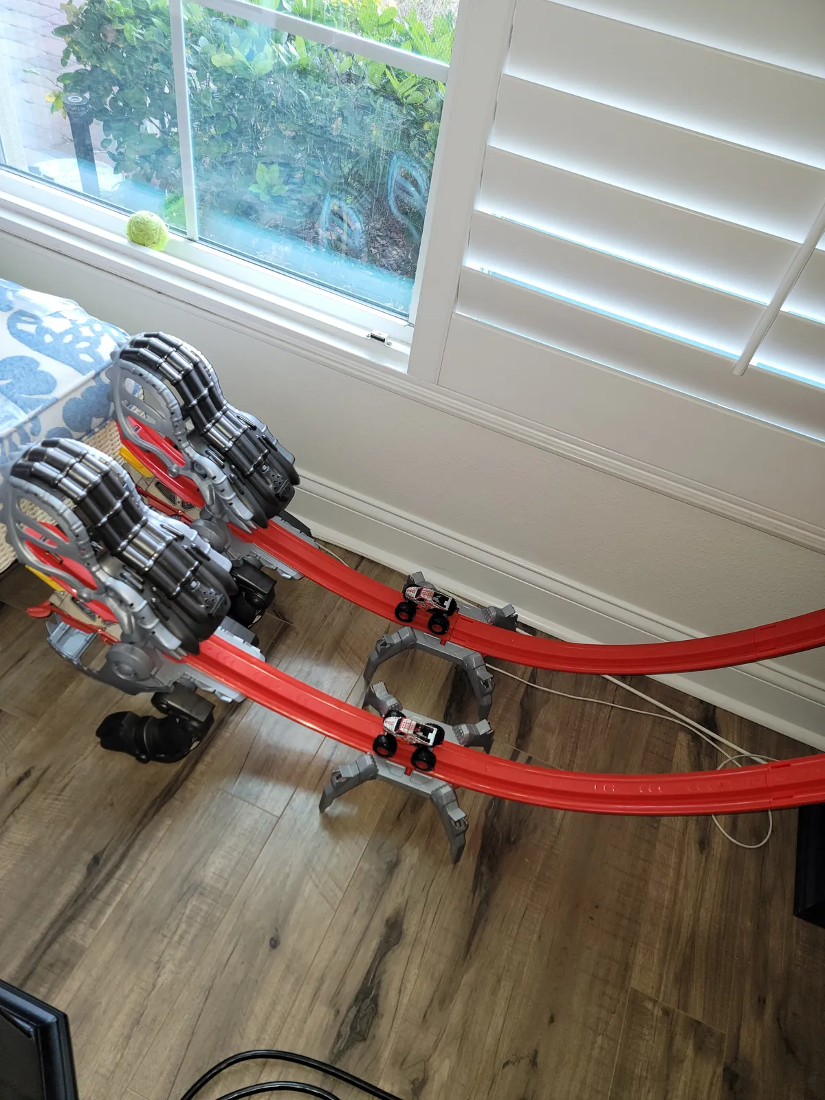 Hot Wheels Monster Jam loop track toy set assembled in a Florida living room on Christmas morning
