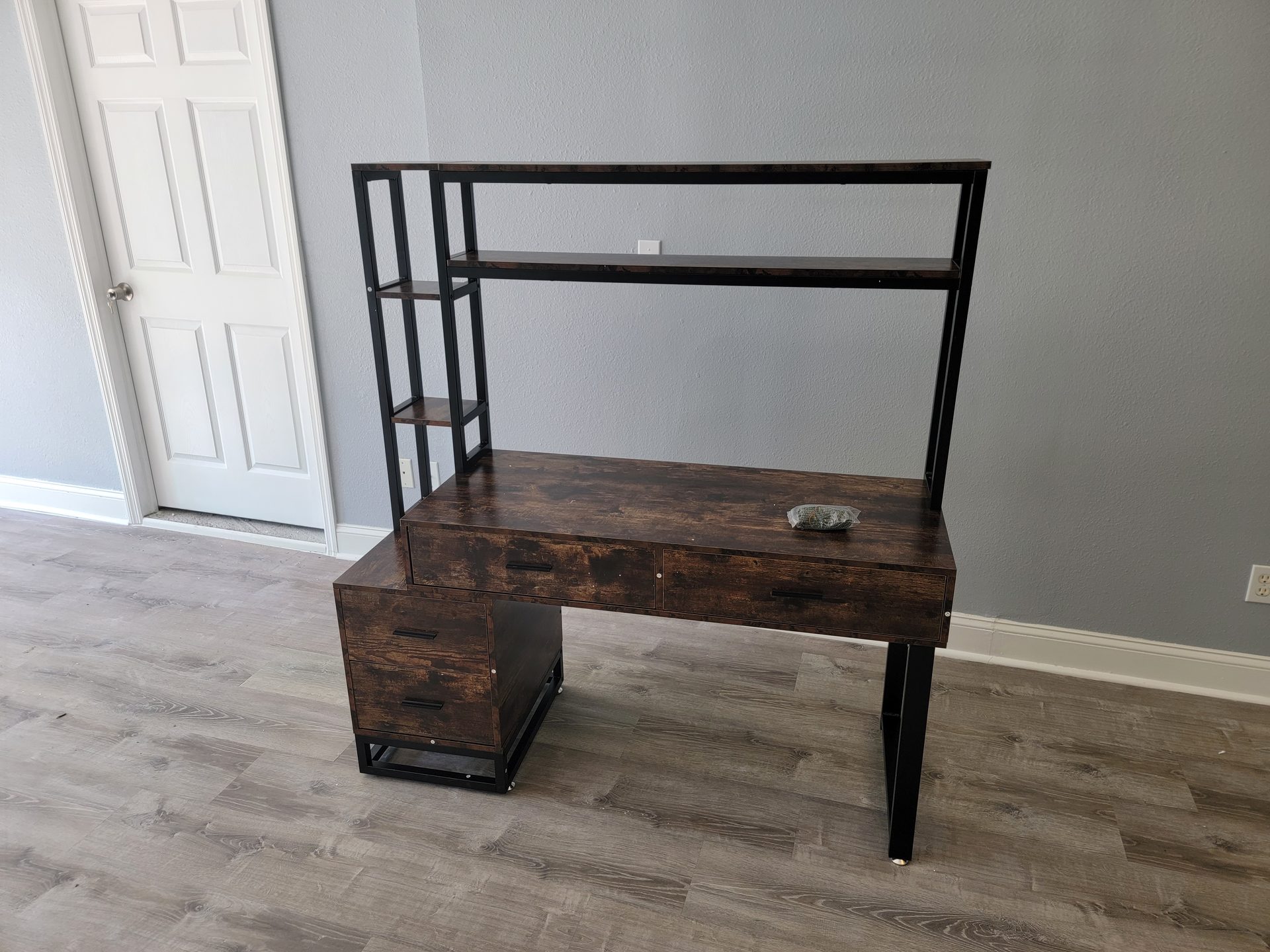 Industrial style desk with hutch shelves and drawers assembled by DR Assembly