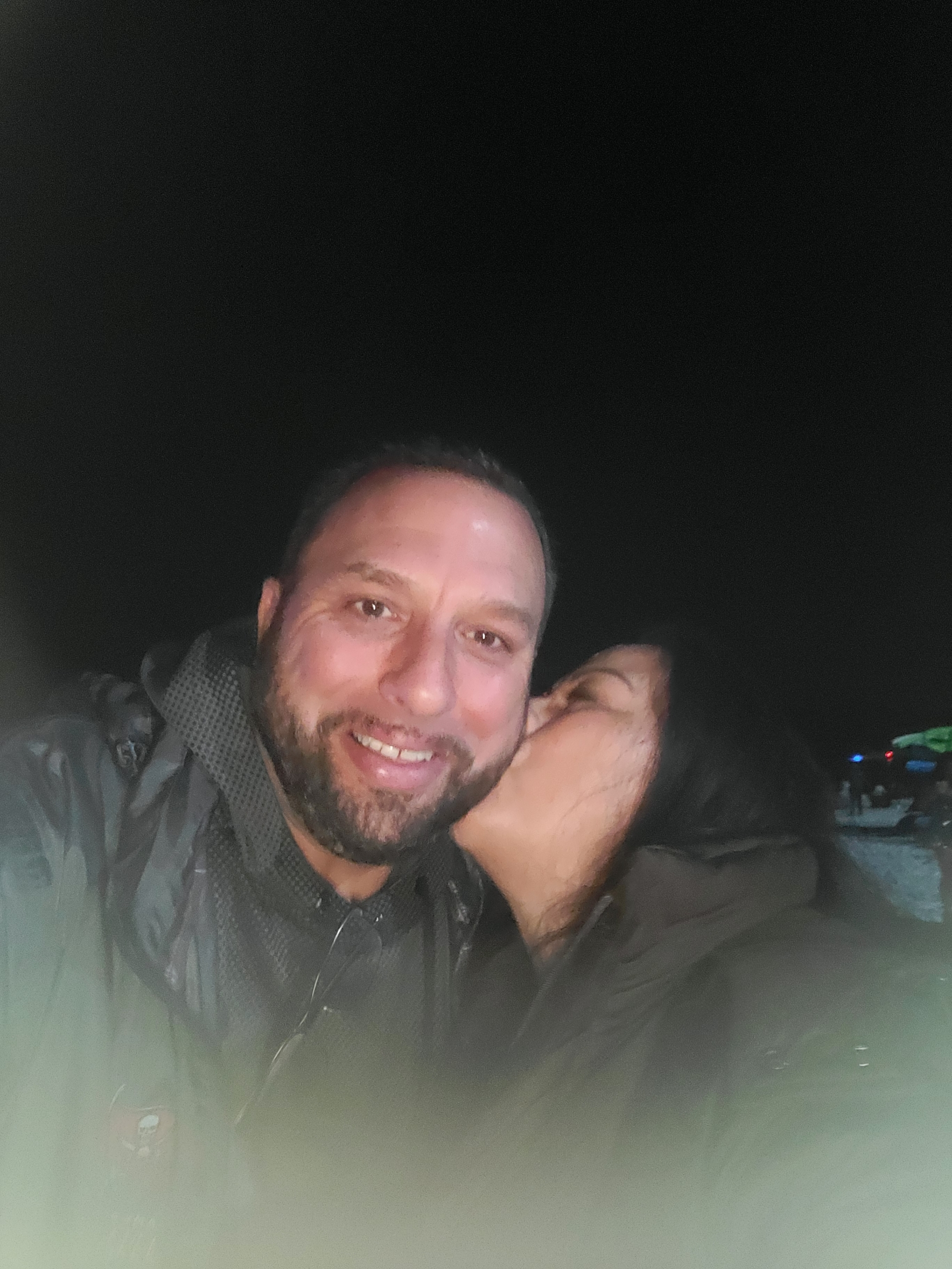 The Fire Pit Kiss — New Year's Eve. A fire pit, a borrowed jacket, and a kiss under the fireworks. The spark that built an empire.